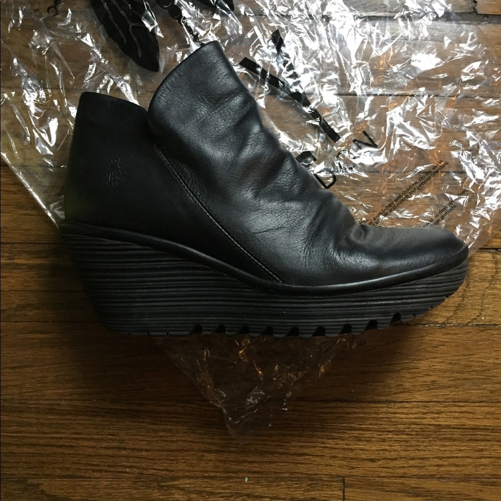Fly London Black leather Yip ankle boot.